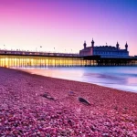 브라이튼 해변에서 즐길 수 있는 액티비티 - **Brighton Beach and Twinkling Pier at Sunset**
    A picturesque, wide-angle view of Brighton's peb...